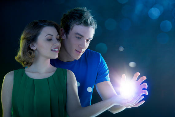 Young couple holding light